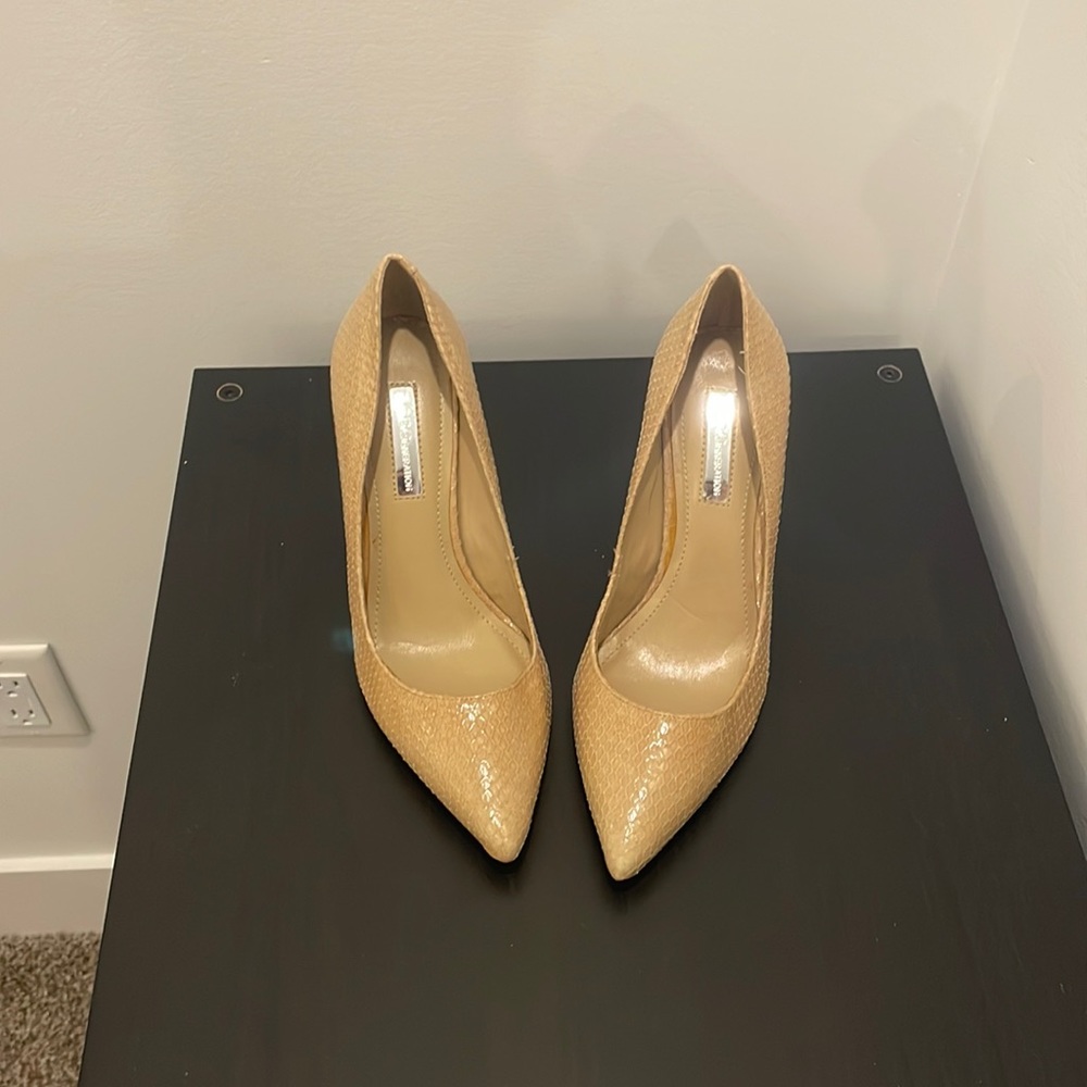 BCBGeneration tan pump. Worn once, size. 6.5. Immaculate condition